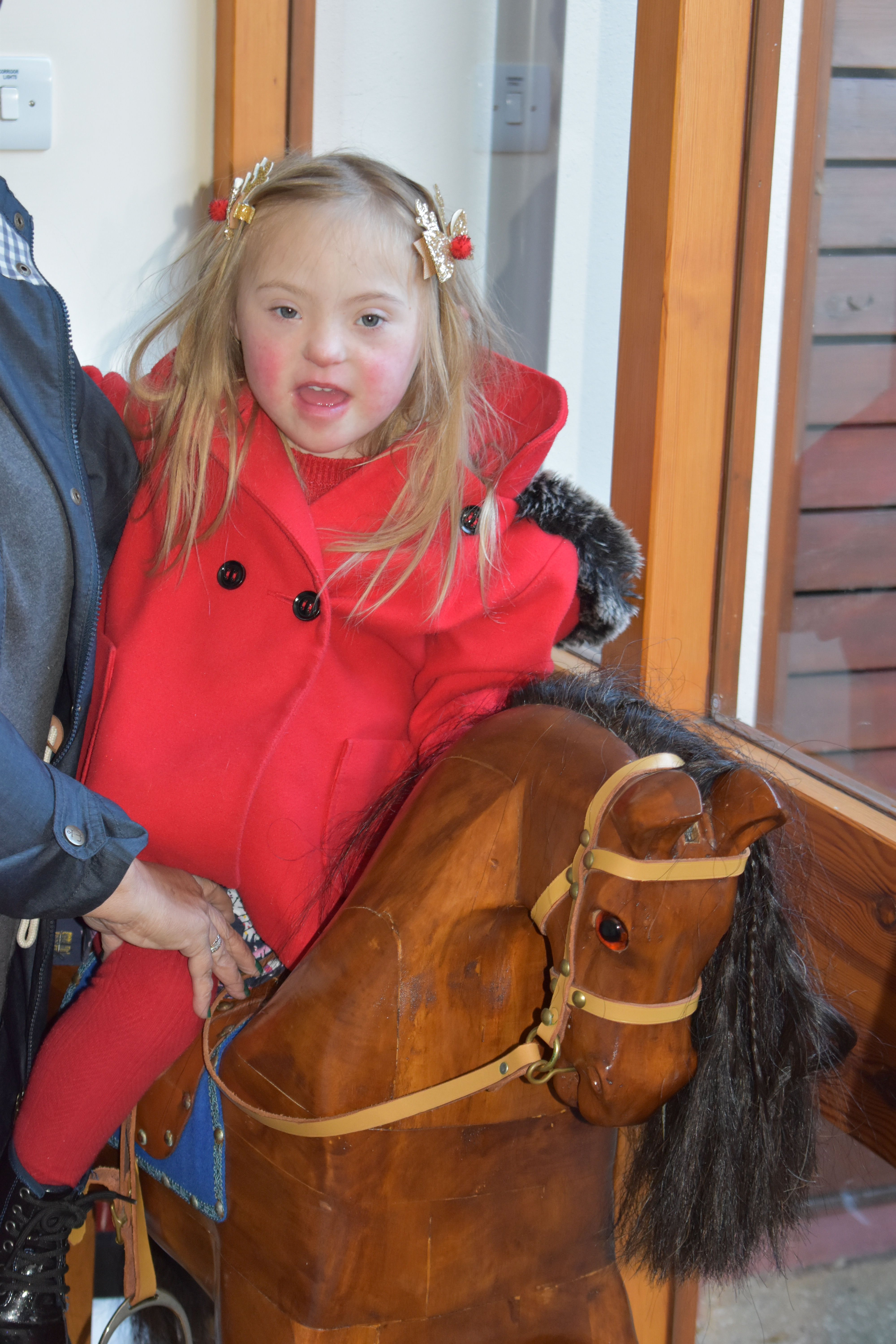 Girl on a rocking horse